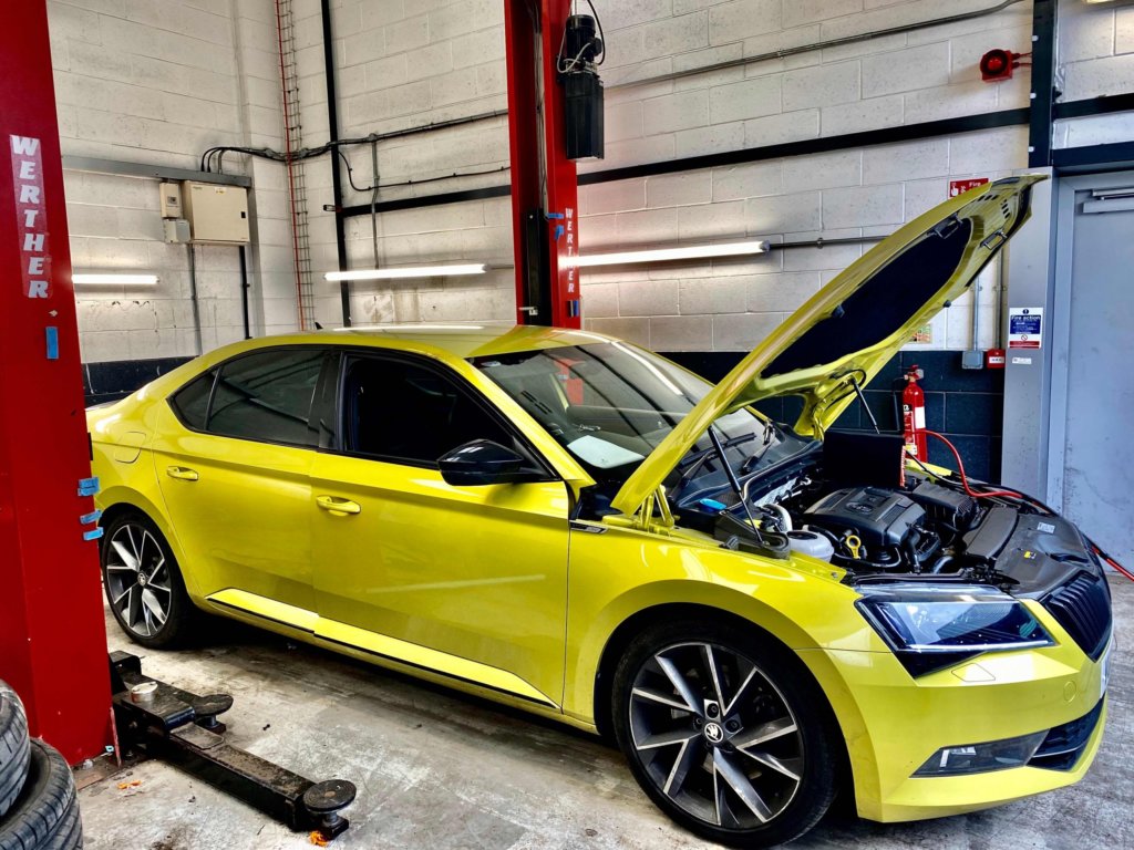 Lime green Skoda being mapped by top tuning
